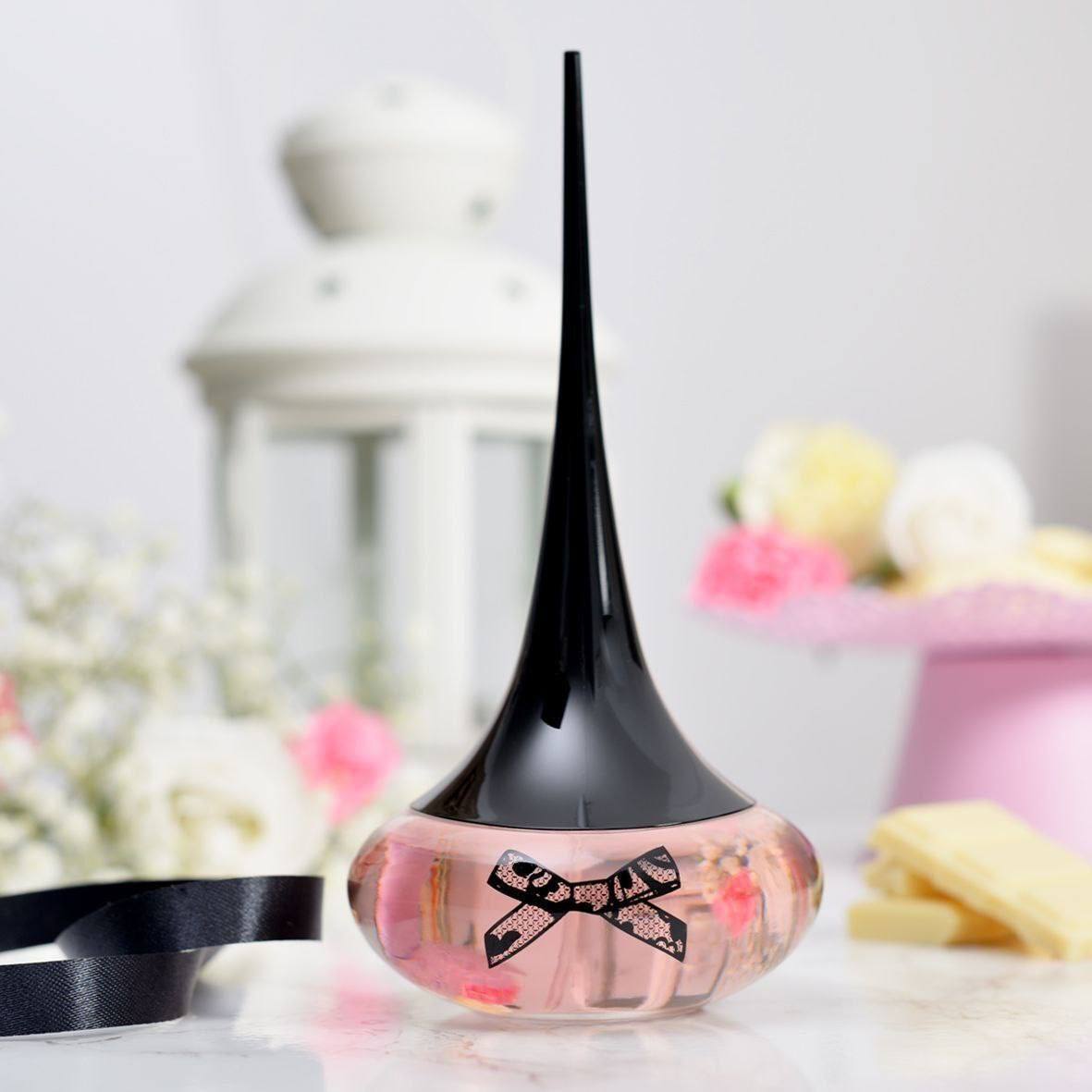 عطر زنانه لاوپوشن سکرت ۵۰ میل با رایحه‌ای گرم، جذاب و ماندگار مناسب استفاده روزانه و مهمانی